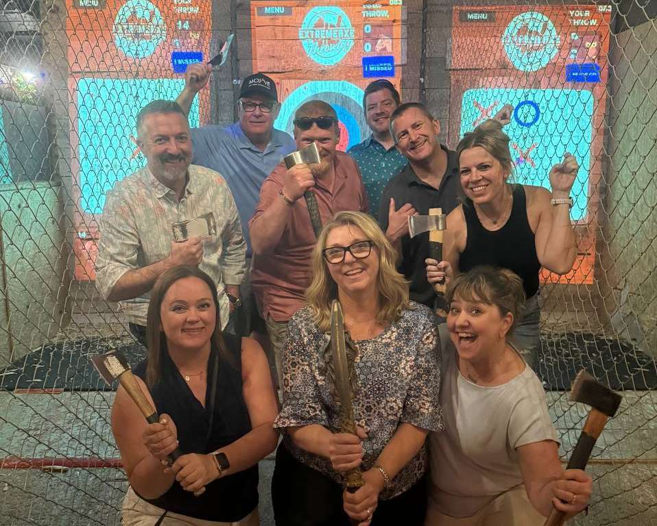 Group enjoying axe throwing at Extreme Axe Throwing Hollywood Florida contact page