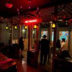 Couples and friends enjoying indoor axe throwing date night near Fort Lauderdale