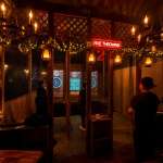 Cozy indoor axe throwing venue in Hollywood Florida with warm lighting and social atmosphere